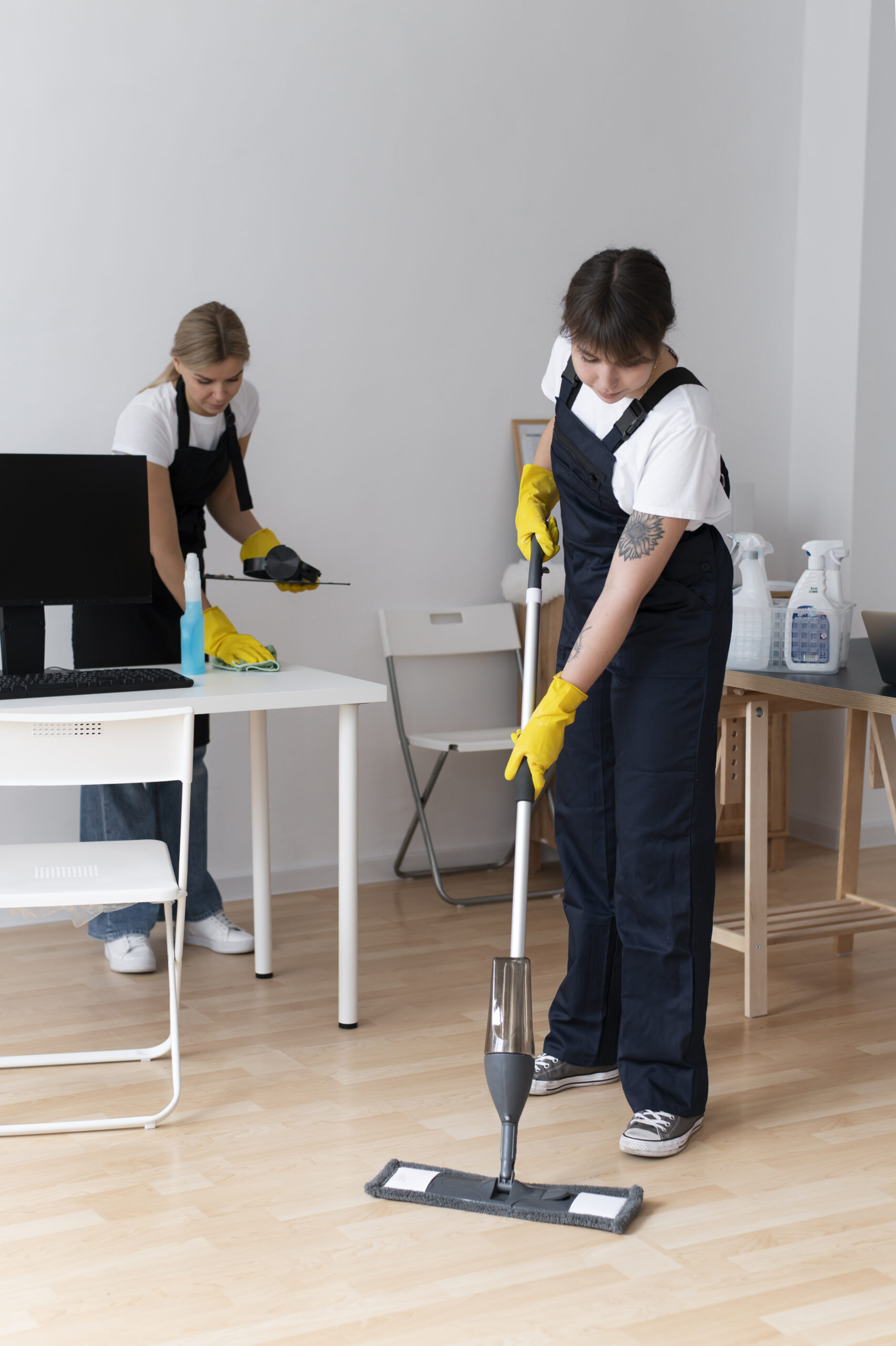 Professional cleaners carrying out office cleaning services in Manchester